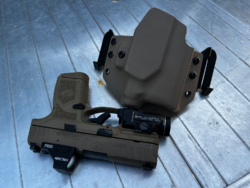 Curved Light Bearing Outside the Waistband Holster